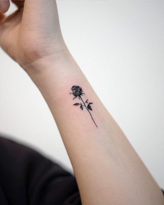 inner arm rose tattoo