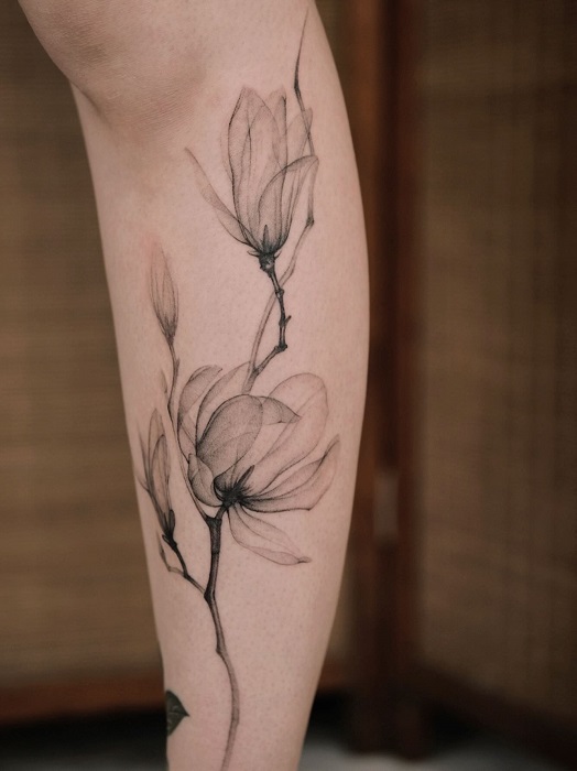 fine line magnolia calf tattoo