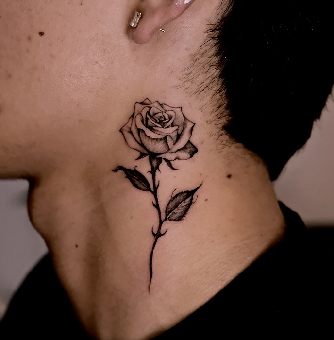 side of neck rose tattoo