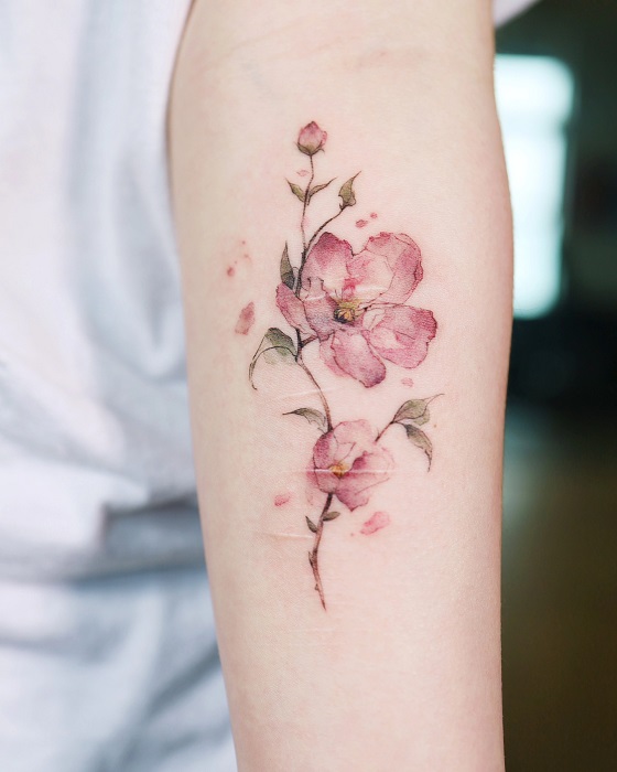 watercolor magnolia tattoo